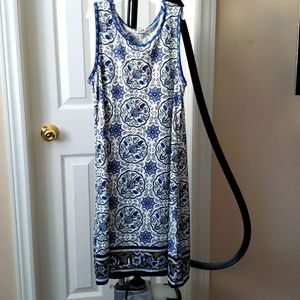 Beautiful blue and white dress with stunning flower patterns.